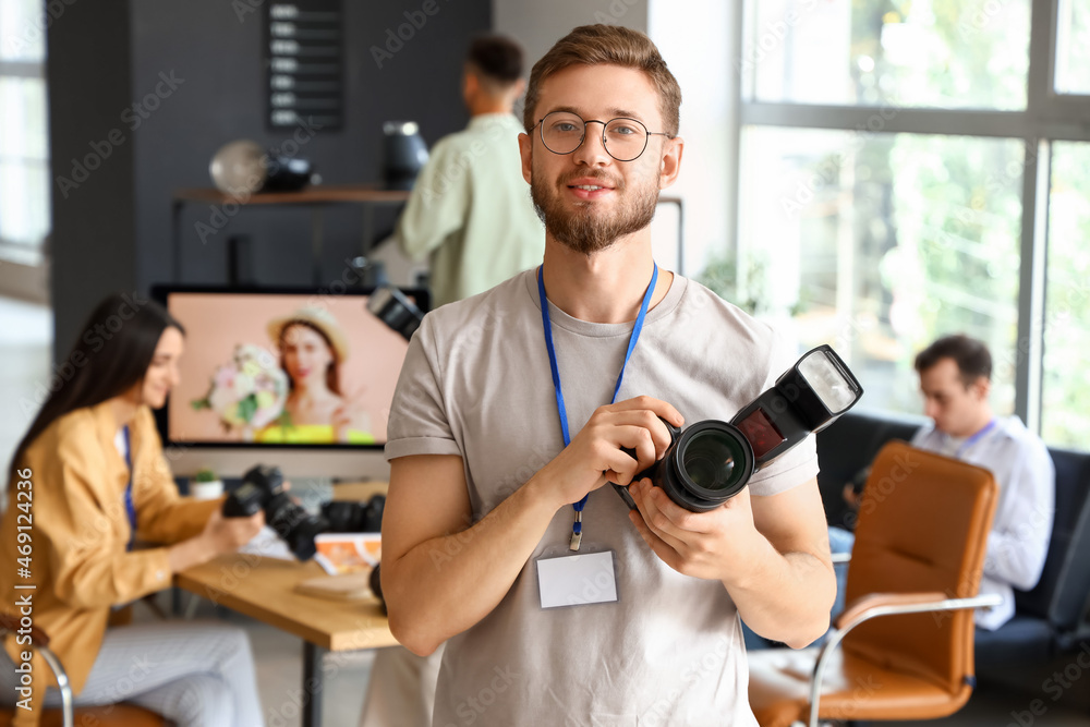 Male photographer during classes in studio