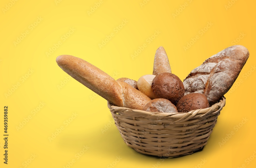 Various kinds of bread stuff. Bread rolls, baguette, sweet bun, croissant and bagel.