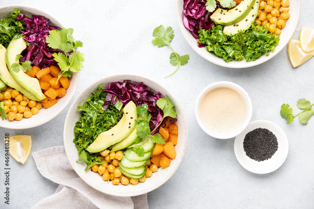 Vegan Buddha bowl with roasted chickpeas and tahini sauce