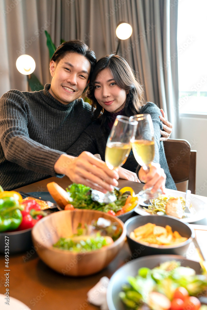 asian marry couple happiness cheerful dinner ,Beautiful adult couple toasting with glasses of wine s