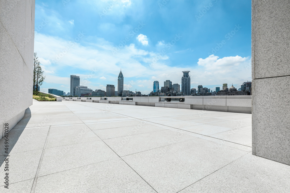 Panoramic skyline and modern commercial buildings with empty road.empty square floors and cityscape.