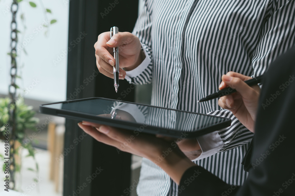 Businessman and partner hand holding pencil and making presentation business strategy.