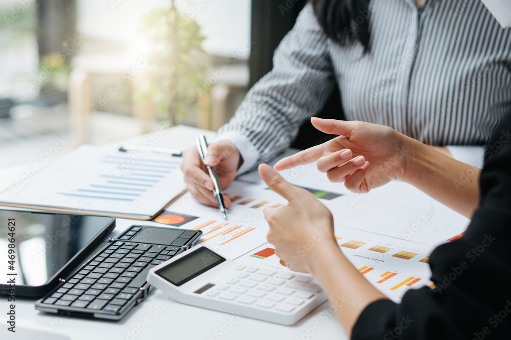 Businessman and partner hand holding pencil and making presentation business strategy.