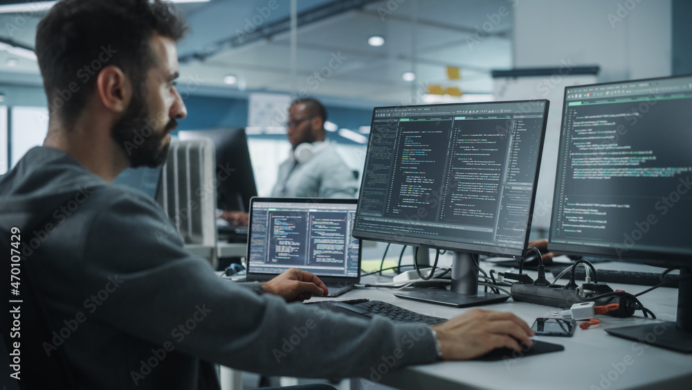 Diverse Office: Enthusiastic White IT Programmer Working on Desktop Computer. Male Specialist Creati