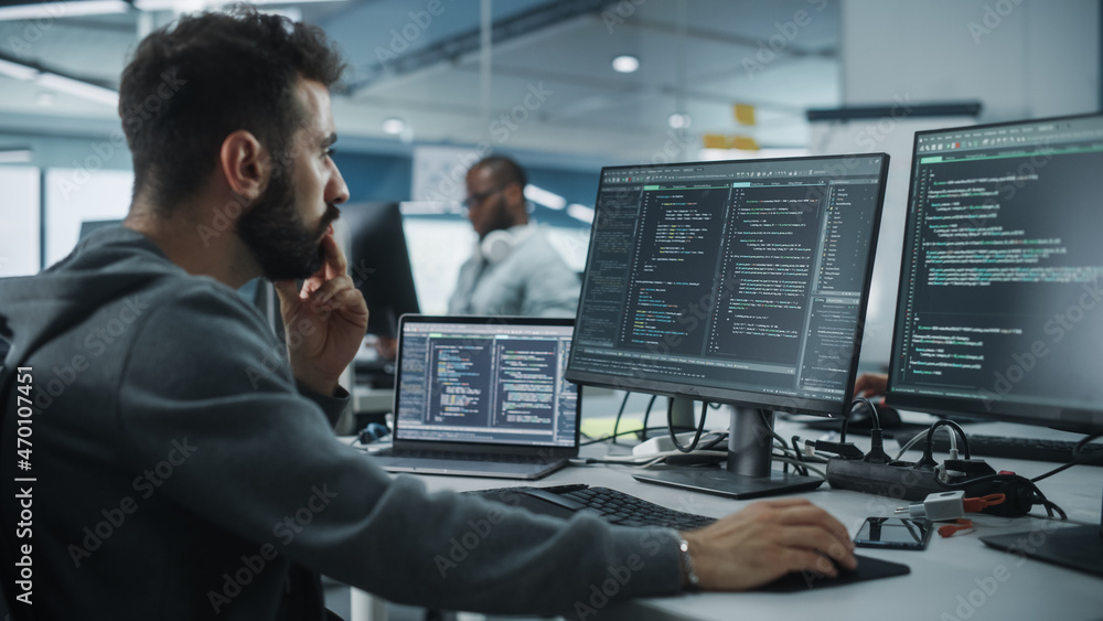 Diverse Office: Enthusiastic White IT Programmer Working on Desktop Computer. Male Specialist Creati