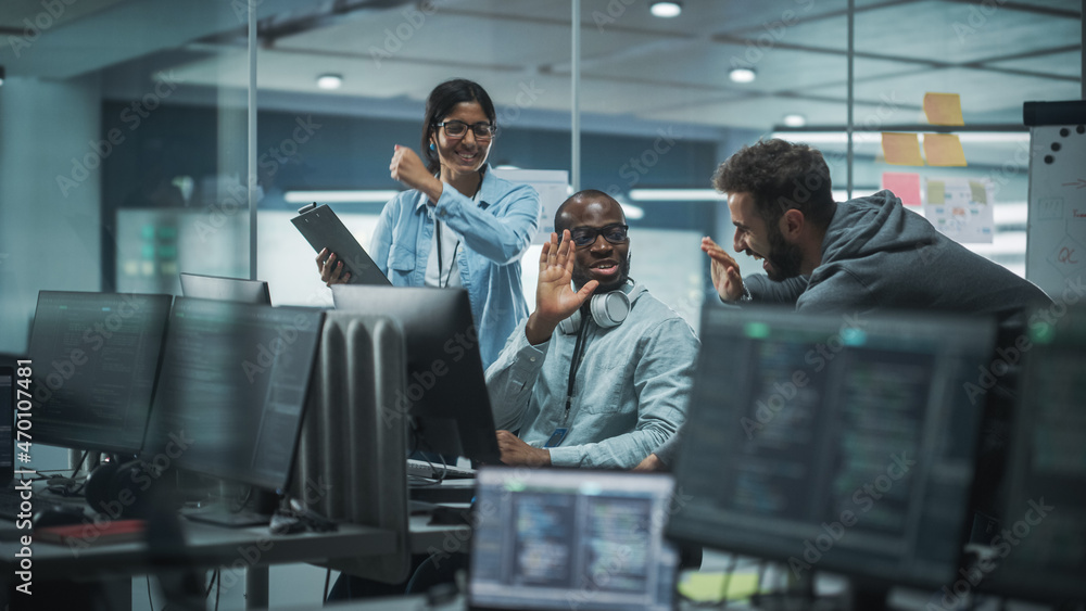 Diverse Group of Professionals Celebrate Success in Modern Office: Brainstorming IT Programmers Use 