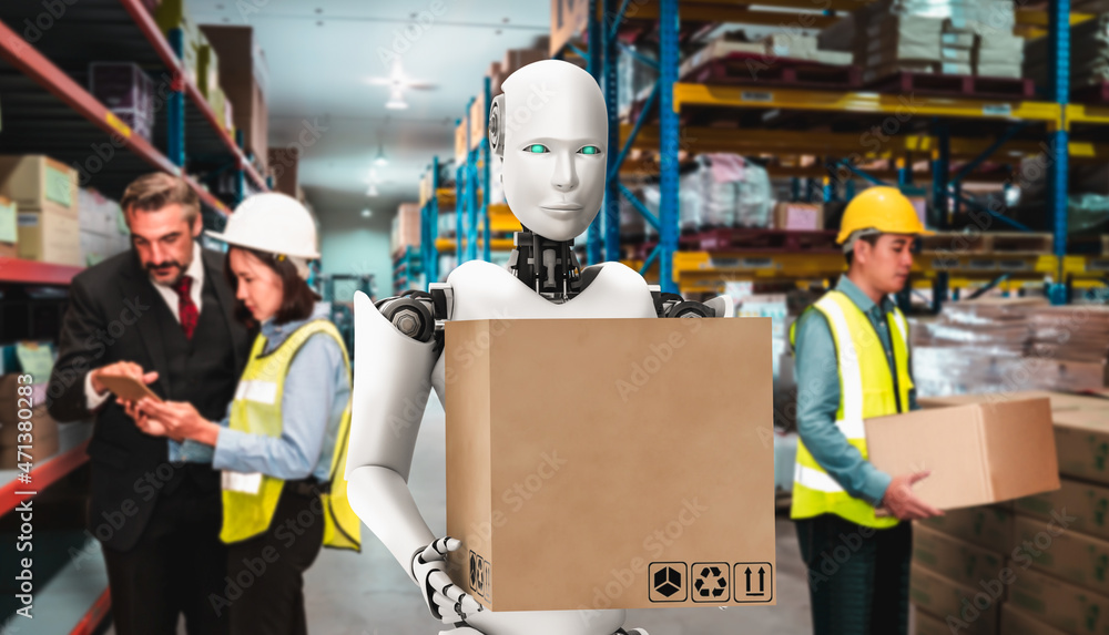 Innovative industry robot working in warehouse together with human worker . Concept of artificial in