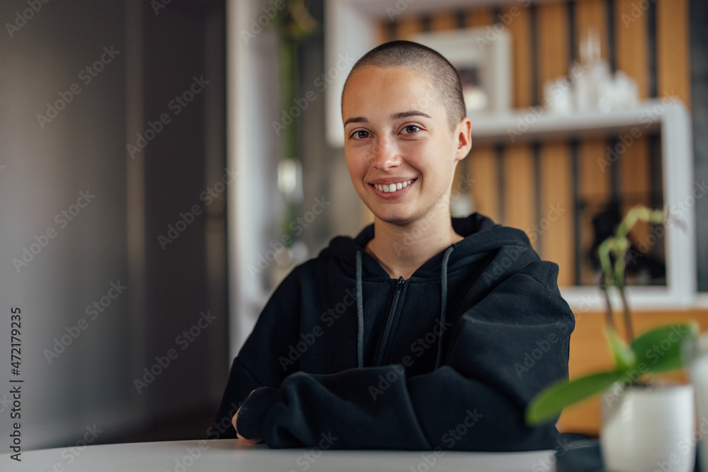 Shot of a friendly caucasian girl, making a wide smile.