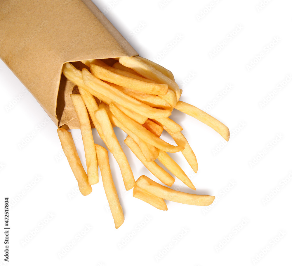 Paper bag with tasty french fries on white background