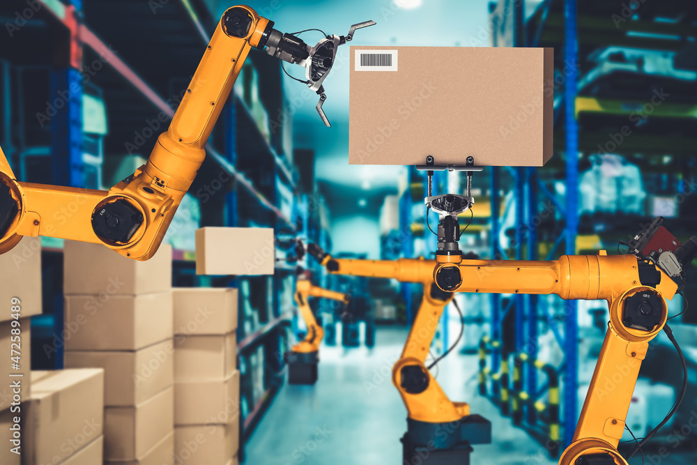 Smart robot arm system for innovative warehouse and factory digital technology . Automation manufact