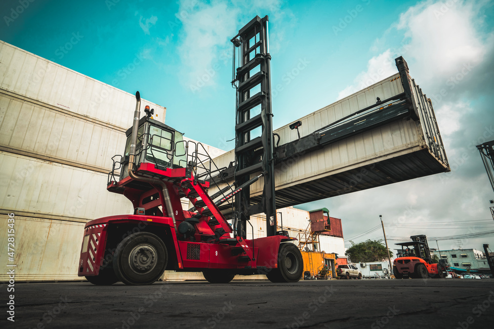 Cargo container for overseas shipping in shipyard with heavy machine . Logistics supply chain manage