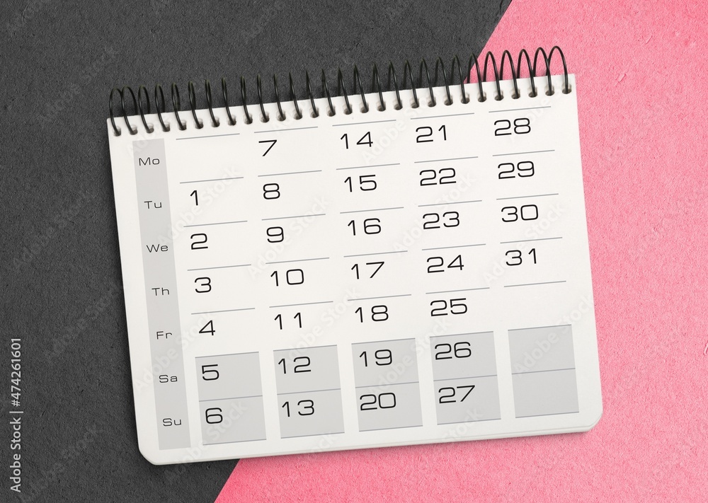 A calendar 2021 with numbers and dates on desk background