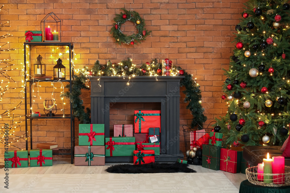 Interior of modern living room with Christmas tree and fireplace