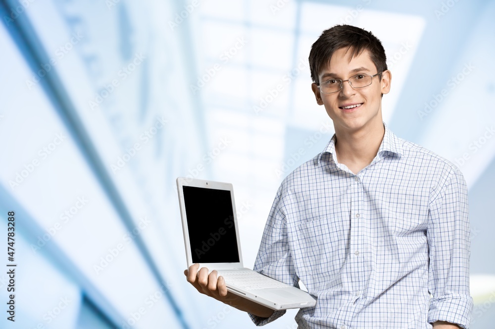 Young boy student hold use work on laptop pc computer