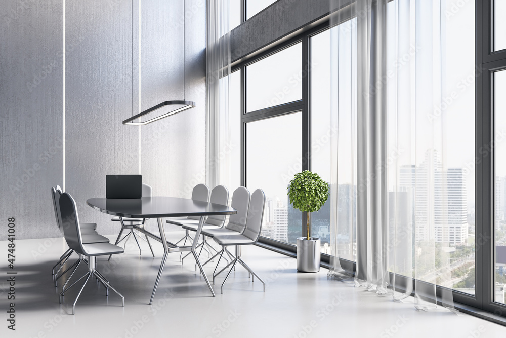 Contemporary meeting room office interior with table, armchairs, window with city view and daylight.