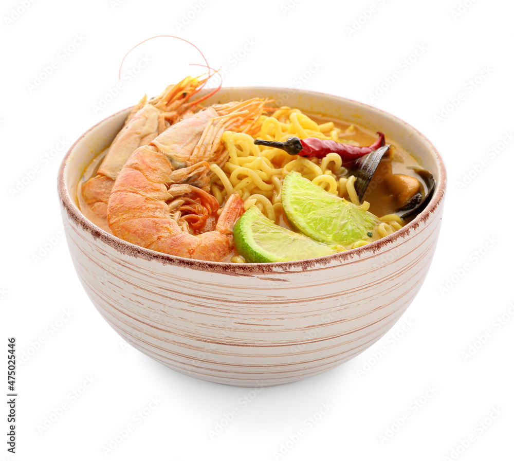 Bowl of tasty Thai soup on white background