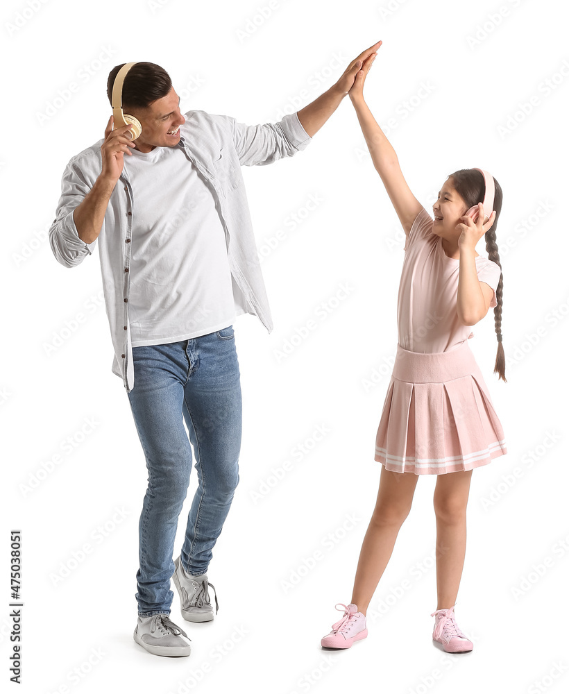 Dancing man and his little daughter on white background