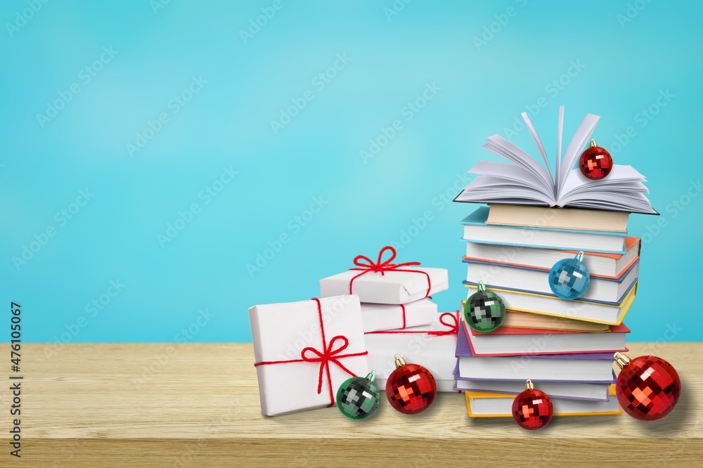 books as christmas gift,christmas present,reading,literature,education,making a gift concept