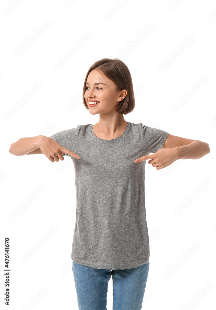 Beautiful young woman in stylish t-shirt on white background