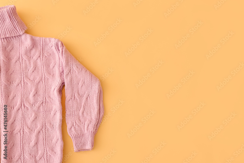 Female roll-neck sweater on color background