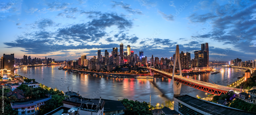 Panoramic skyline and modern commercial buildings in Chongqing at night