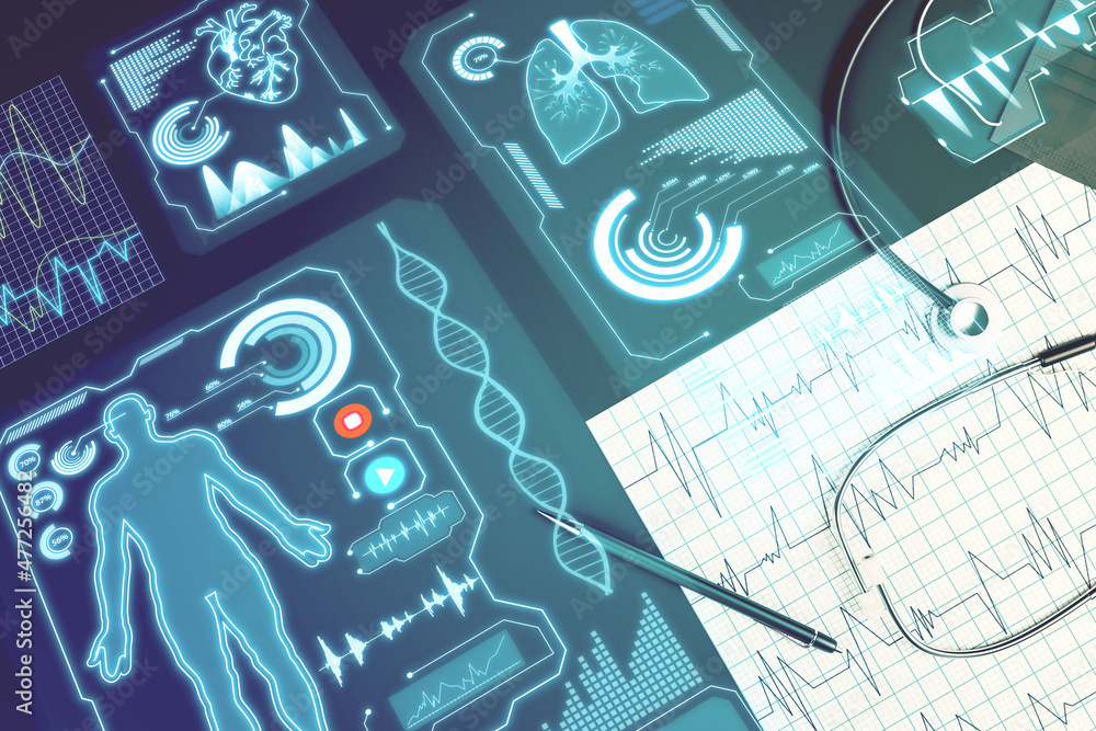 Close up of workplace with supplies, stethoscope, glowing blue medical interface. Healthcare, techno