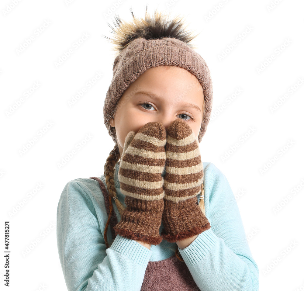 Little girl in stylish winter clothes on white background