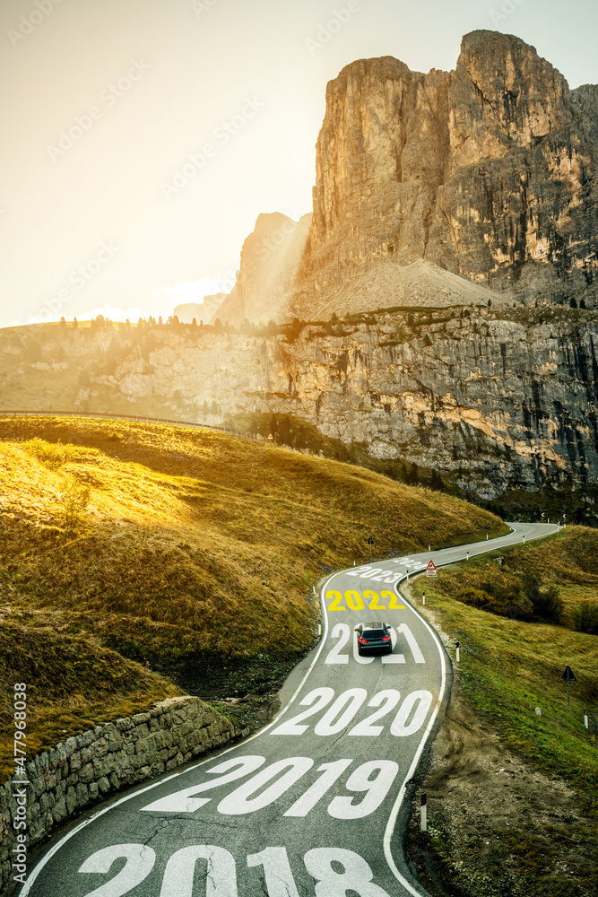 2022 New Year road trip travel and future vision concept . Nature landscape with highway road leadin