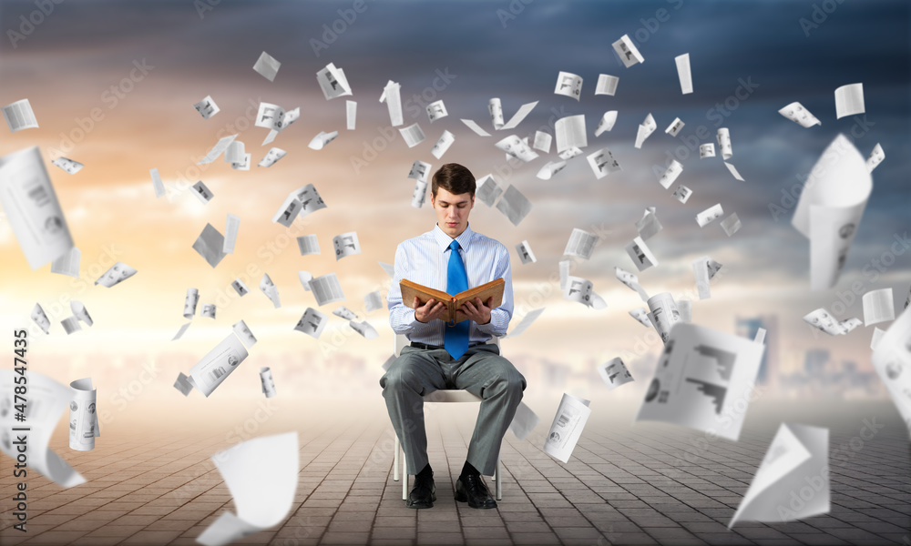 young businessman with book