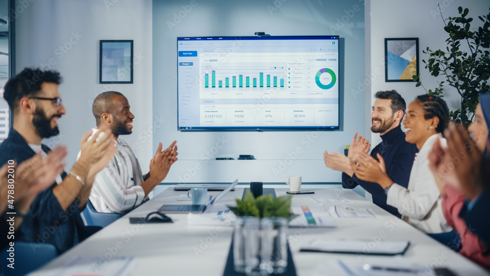 Multi-Ethnic Office Conference Room Meeting: Diverse Team of Managers, Executives Talk, Uses Wall TV