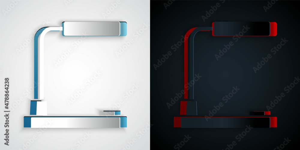 灰色和黑色背景上隔离的剪纸台灯图标。台灯。纸艺风格。矢量