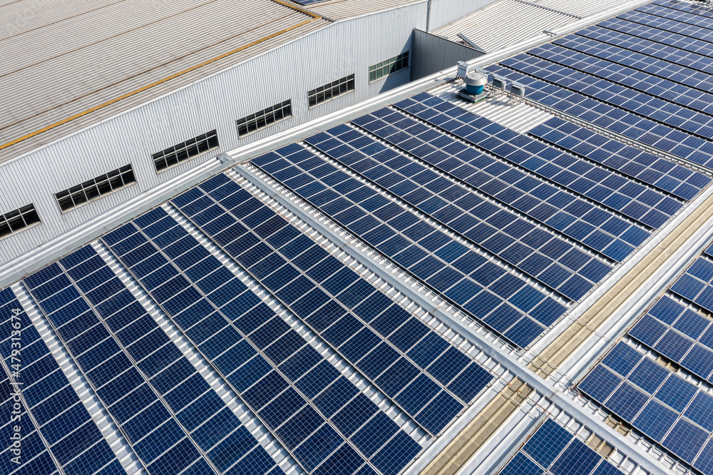 Solar panels on factory rooftop