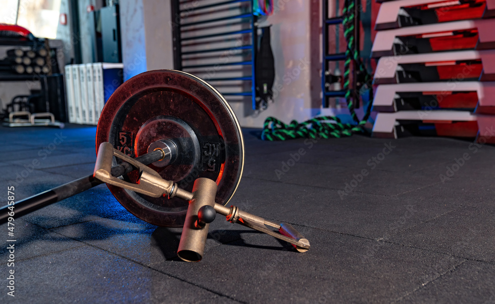 Close up view of gym equipment in modern gym. Sports objects on the floor. Sport and recreation conc