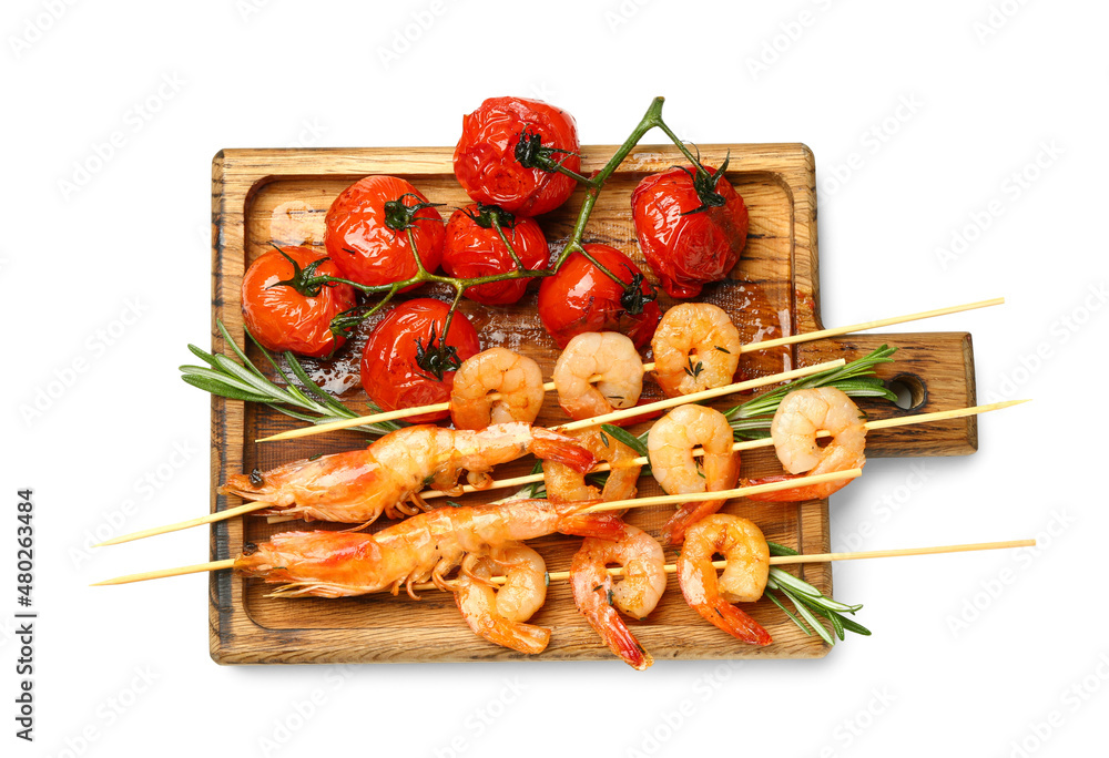 Wooden board with grilled shrimp skewers and tomatoes on white background