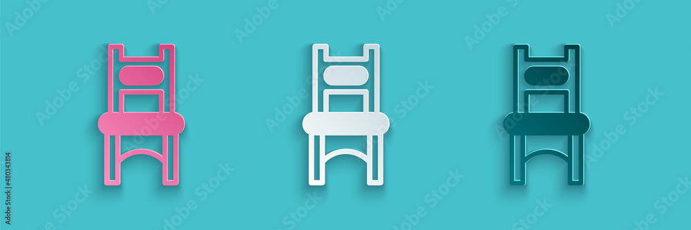 Paper cut Chair icon isolated on blue background. Paper art style. Vector