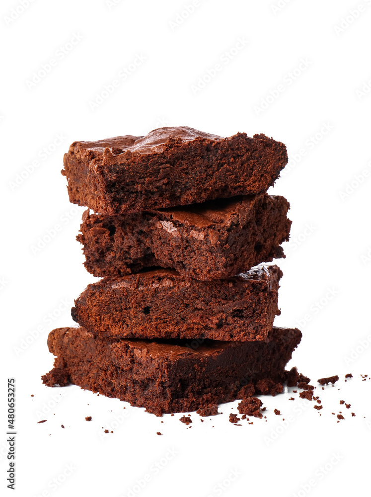 Pieces of tasty chocolate brownie isolated on white background