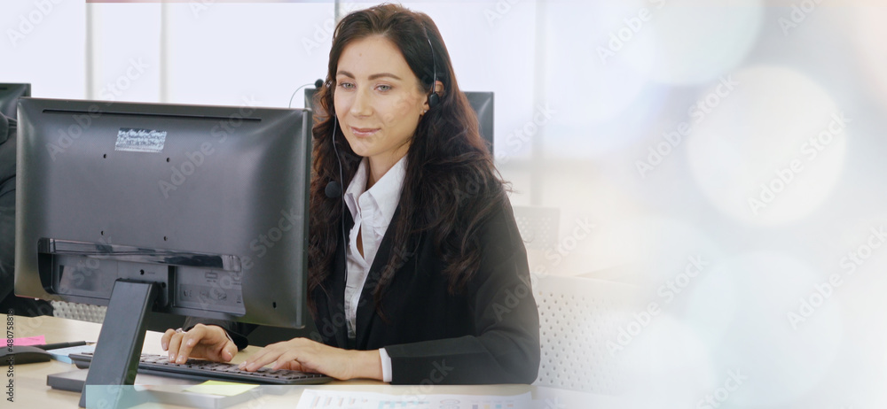 Business people wearing headset working in office to support remote customer or colleague. Call cent