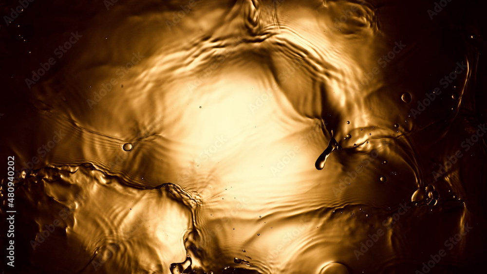 Liquid golden splash texture, beverages background