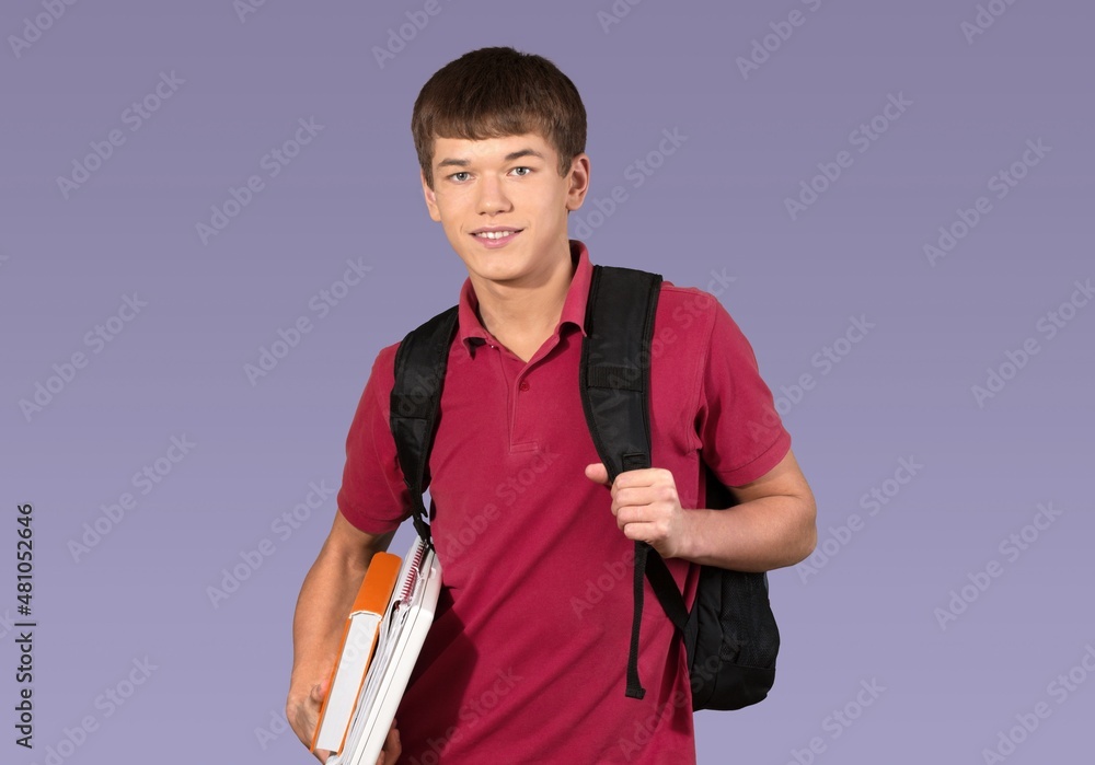 Young boy teen student wear casual clothes and backpack posing