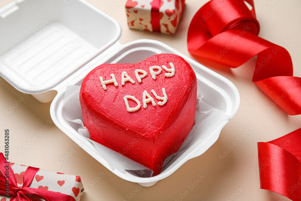 Plastic lunch box with tasty bento cake for Valentines Day on beige background