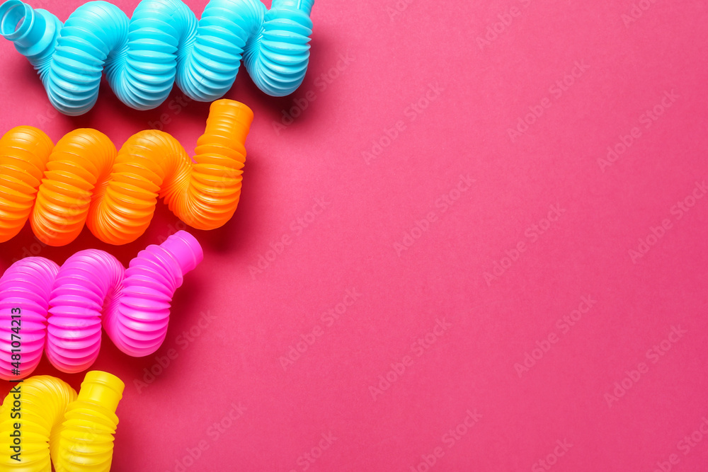 Different Pop Tubes on color background