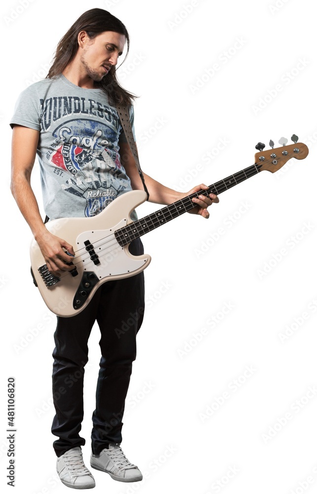 Handsome young boy playing guitar