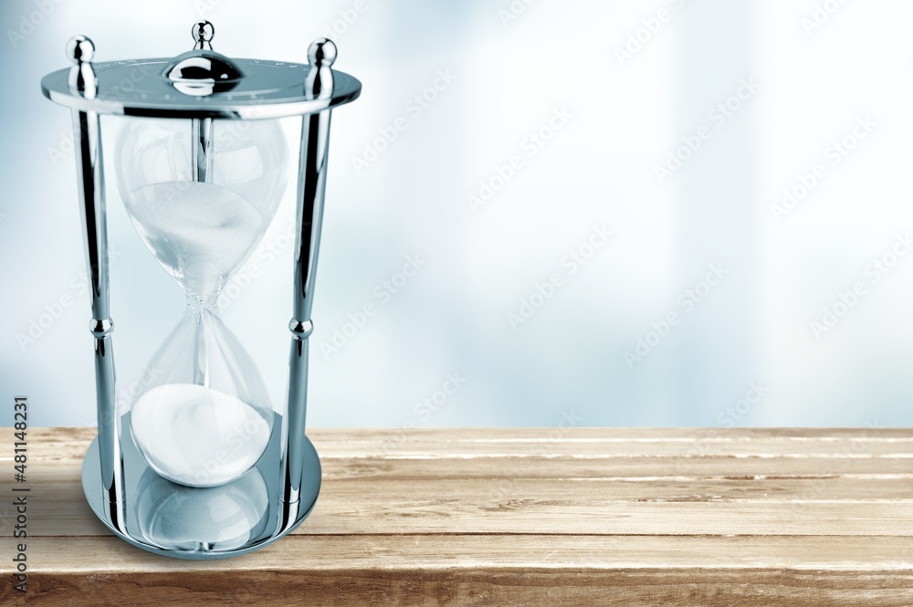 Classic retro glass hourglass, time and the rising temperature of planet Earth.