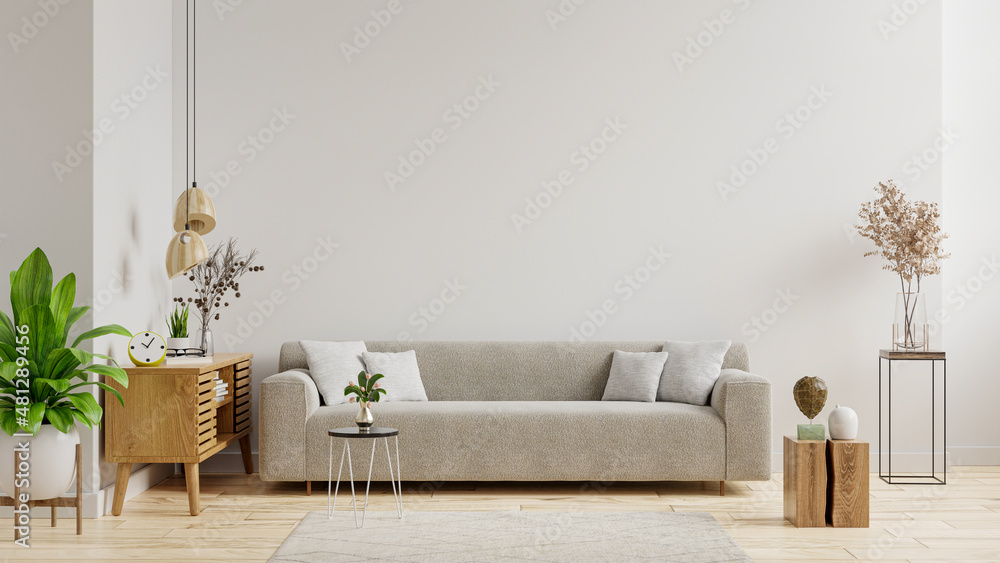 Empty living room with sofa have plants and table on empty white wall background.