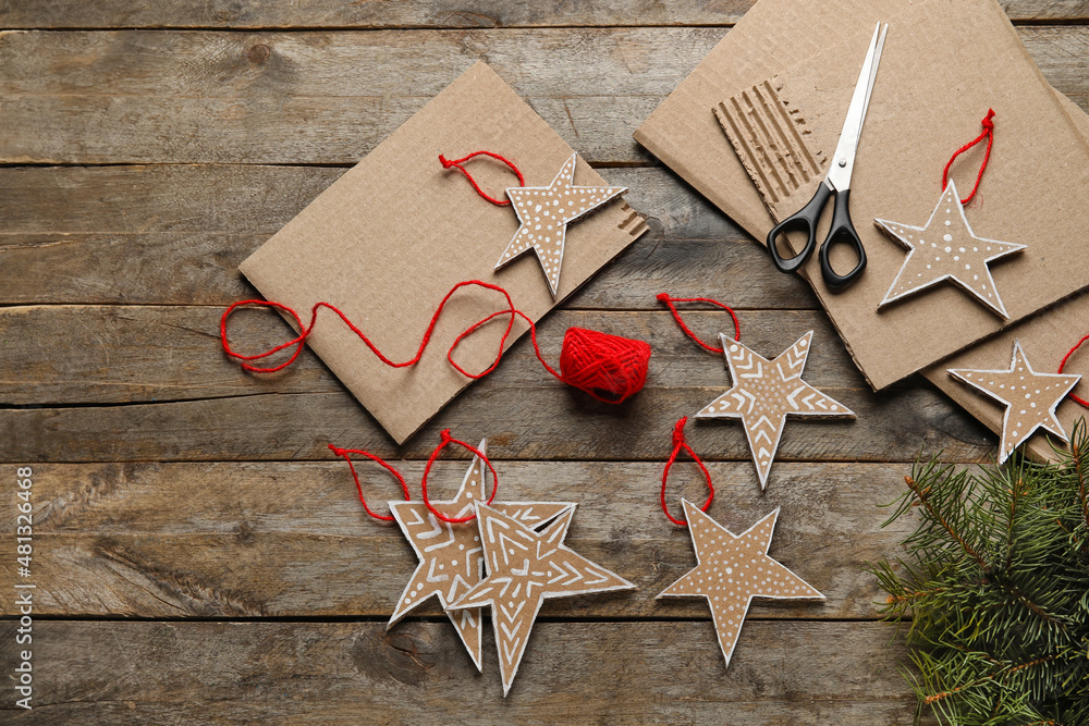 Beautiful handmade Christmas toys on wooden background