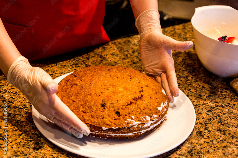 cooking cake decorating in open kitchen