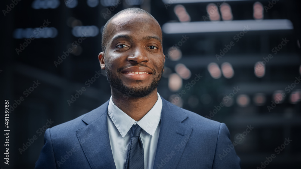 Portrait of Thoughtful Black Businessman wearing Suit, Standing in the Big City Business District St