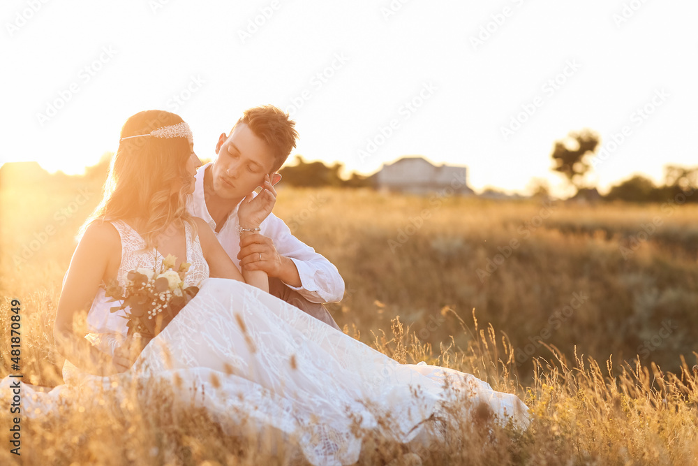 Happy wedding couple in countryside