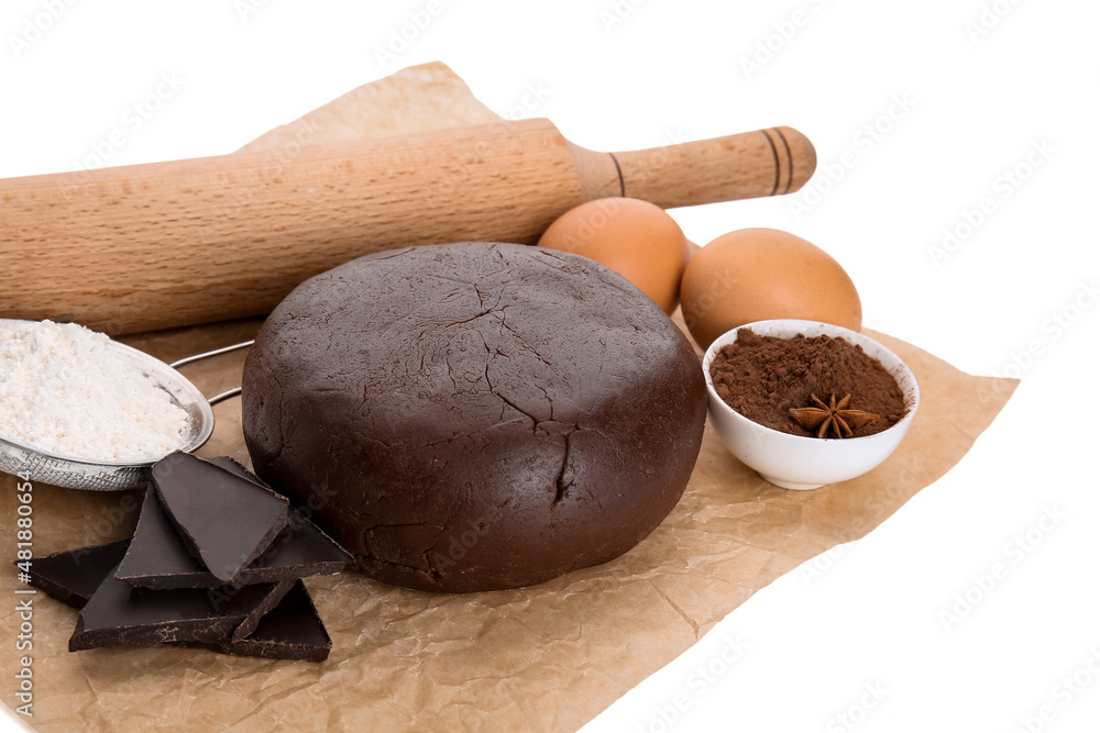 Ingredients for preparing tasty cookies and rolling pin on white background, closeup