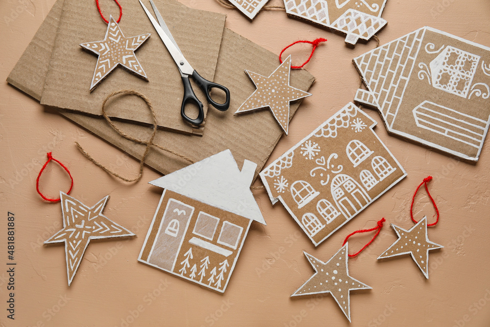 Beautiful handmade Christmas toys on beige background